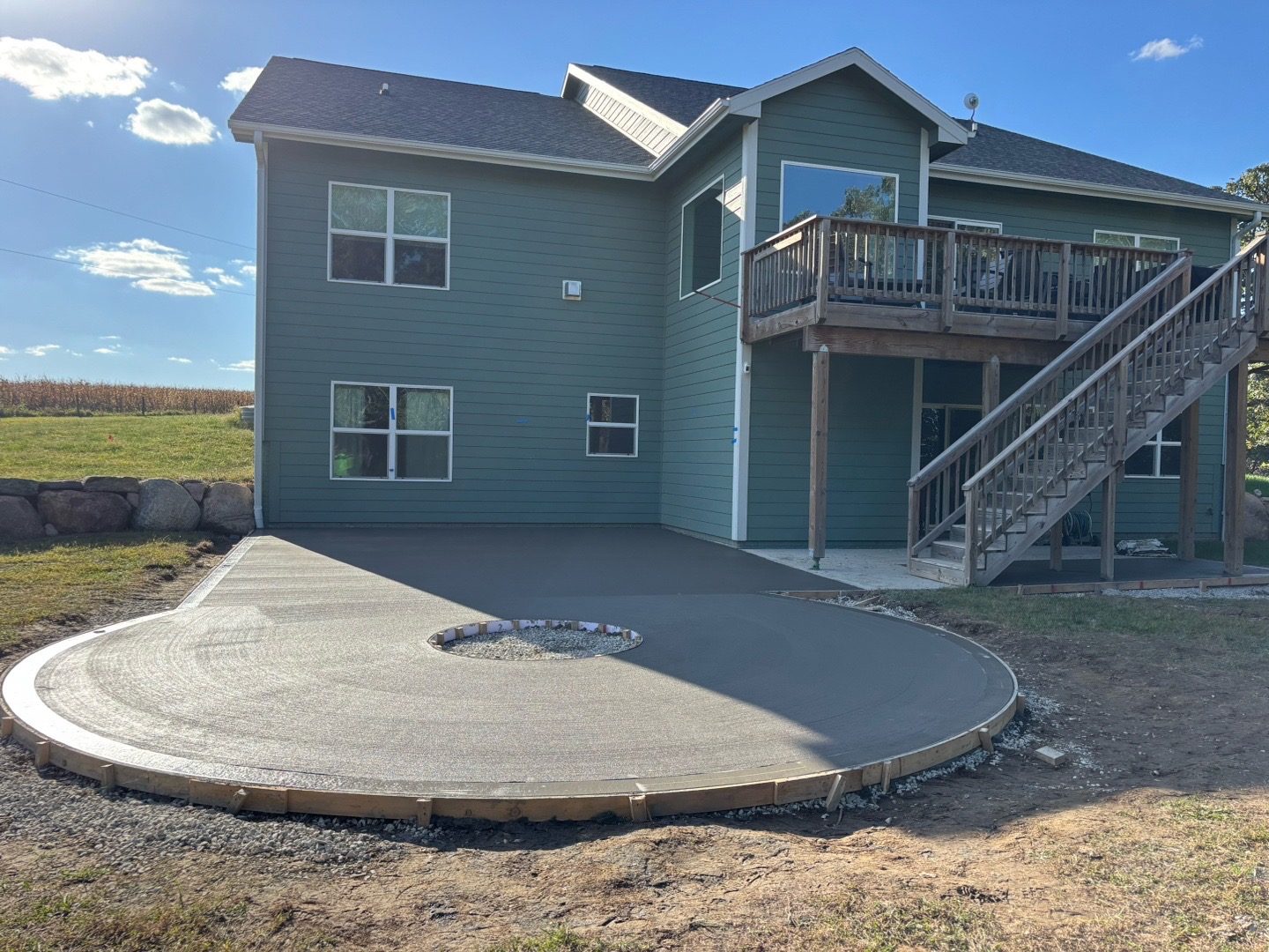 Concrete driveway and patio poured by C&A Concrete